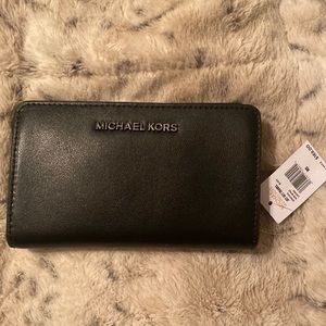 Michael Kors slim bifold in black